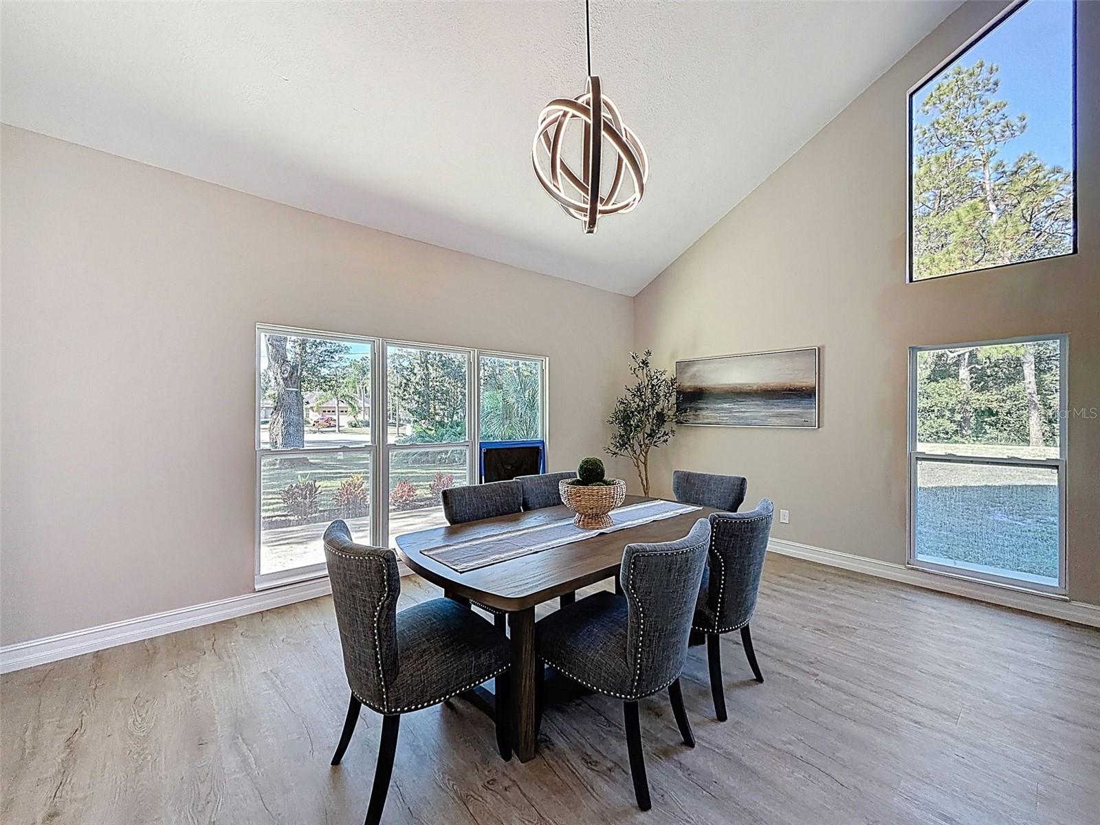 Staged as a huge dining room, but equally fitting as an extended living room.