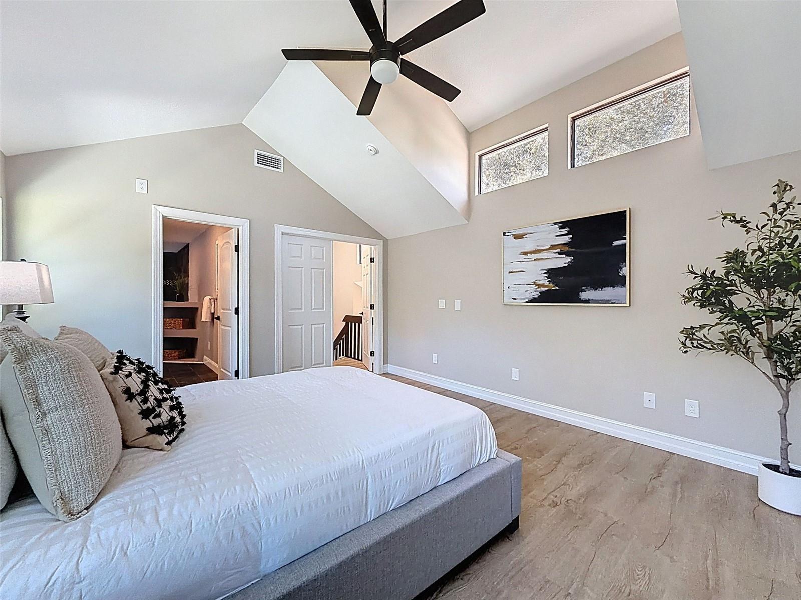 Master bedroom retreat with en-suite bath, WIC, and built-in closets.