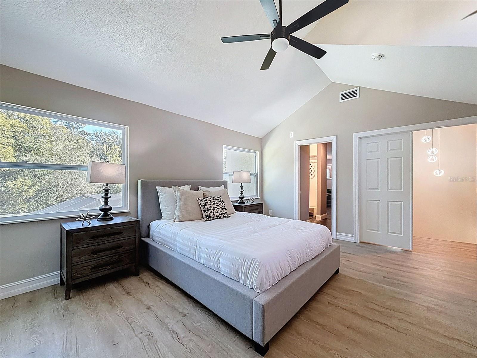 Master bedroom retreat with en-suite bath, WIC, and built-in closets.