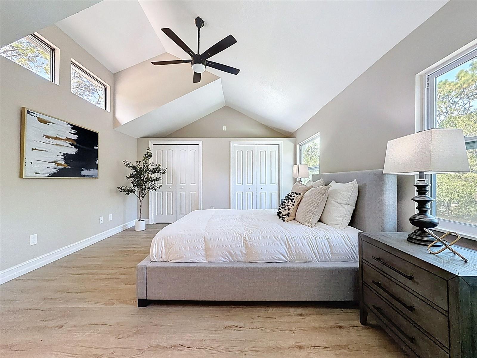Master bedroom retreat with en-suite bath, WIC, and built-in closets.