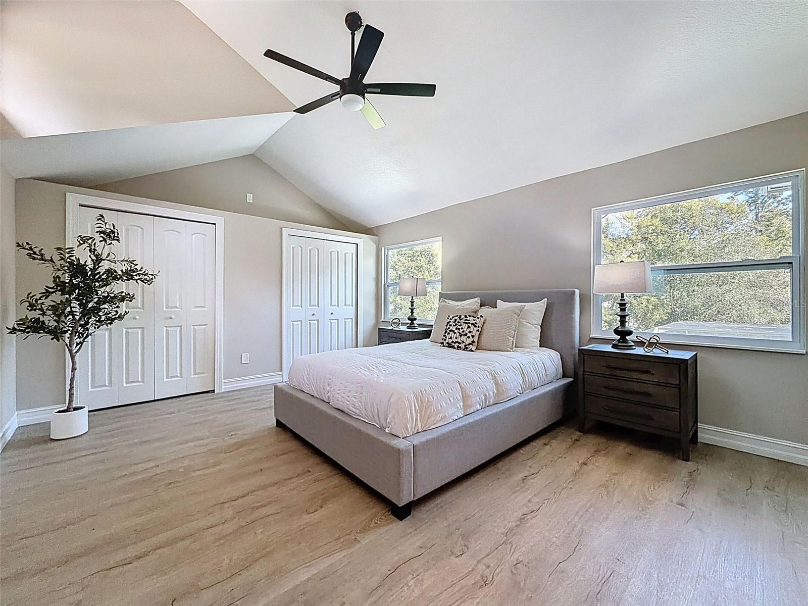 Master bedroom retreat with en-suite bath, WIC, and built-in closets.