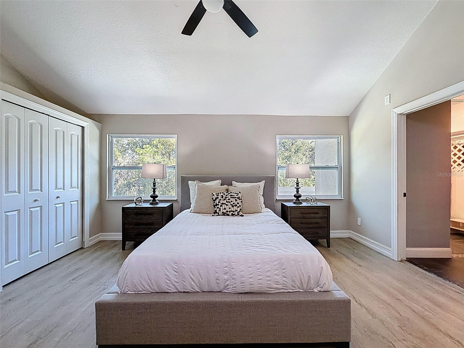 Master bedroom retreat with en-suite bath, WIC, and built-in closets.