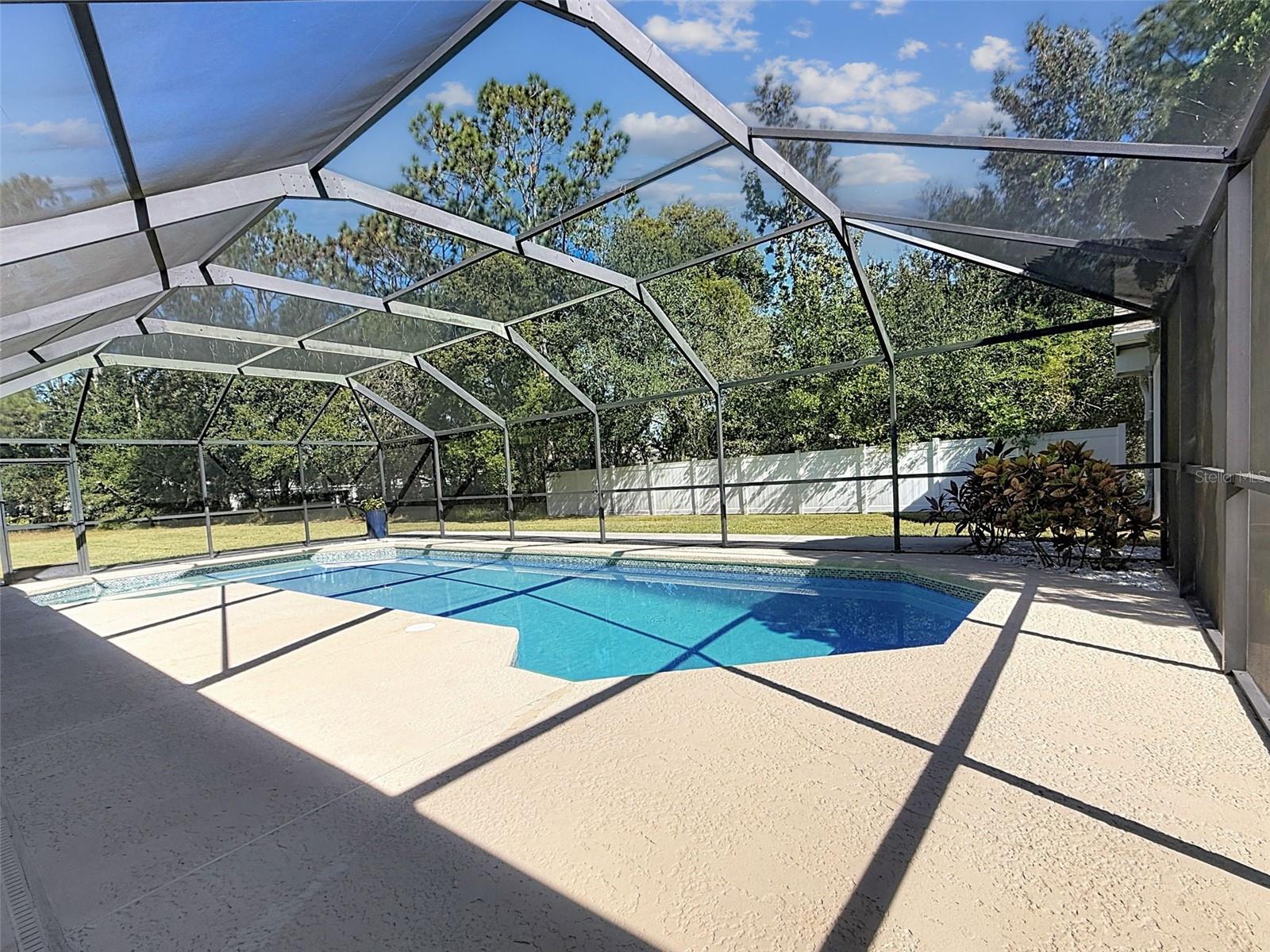 Large screened-in pool.