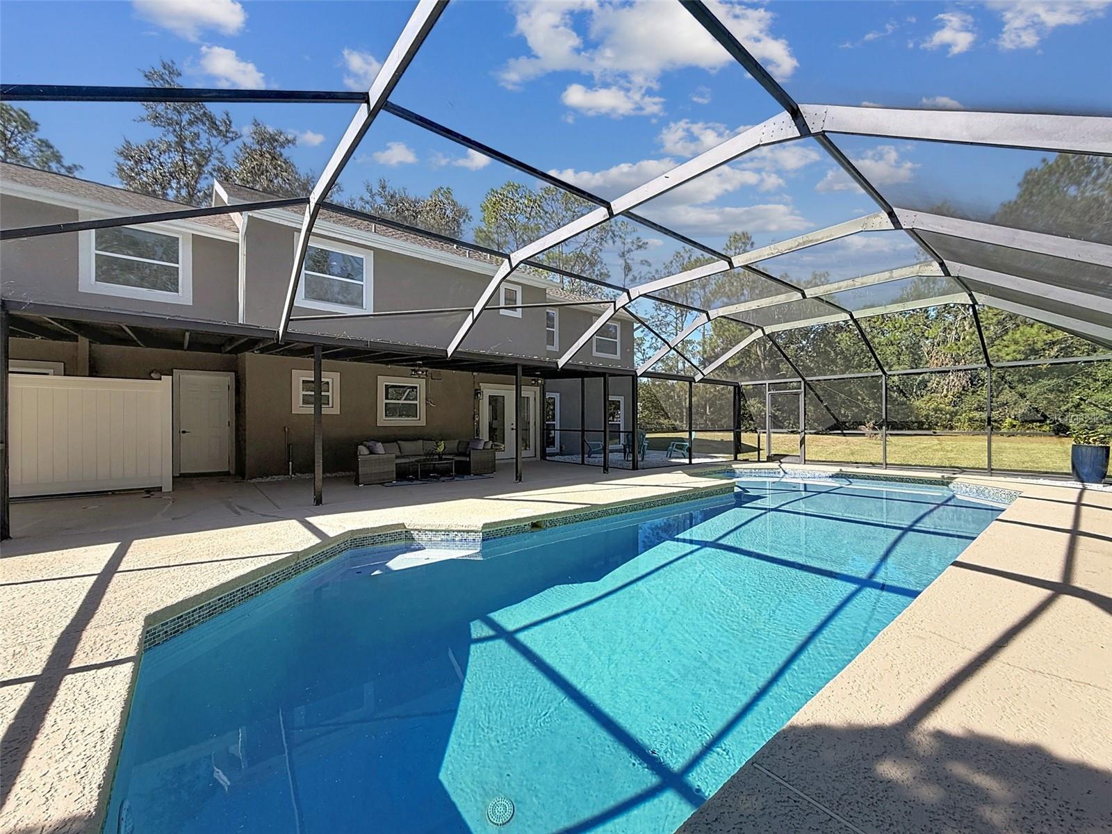 Large screened-in pool.
