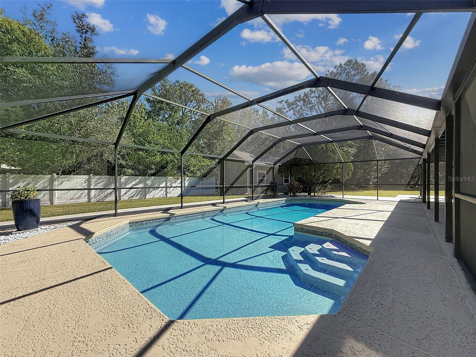 Large screened-in pool.