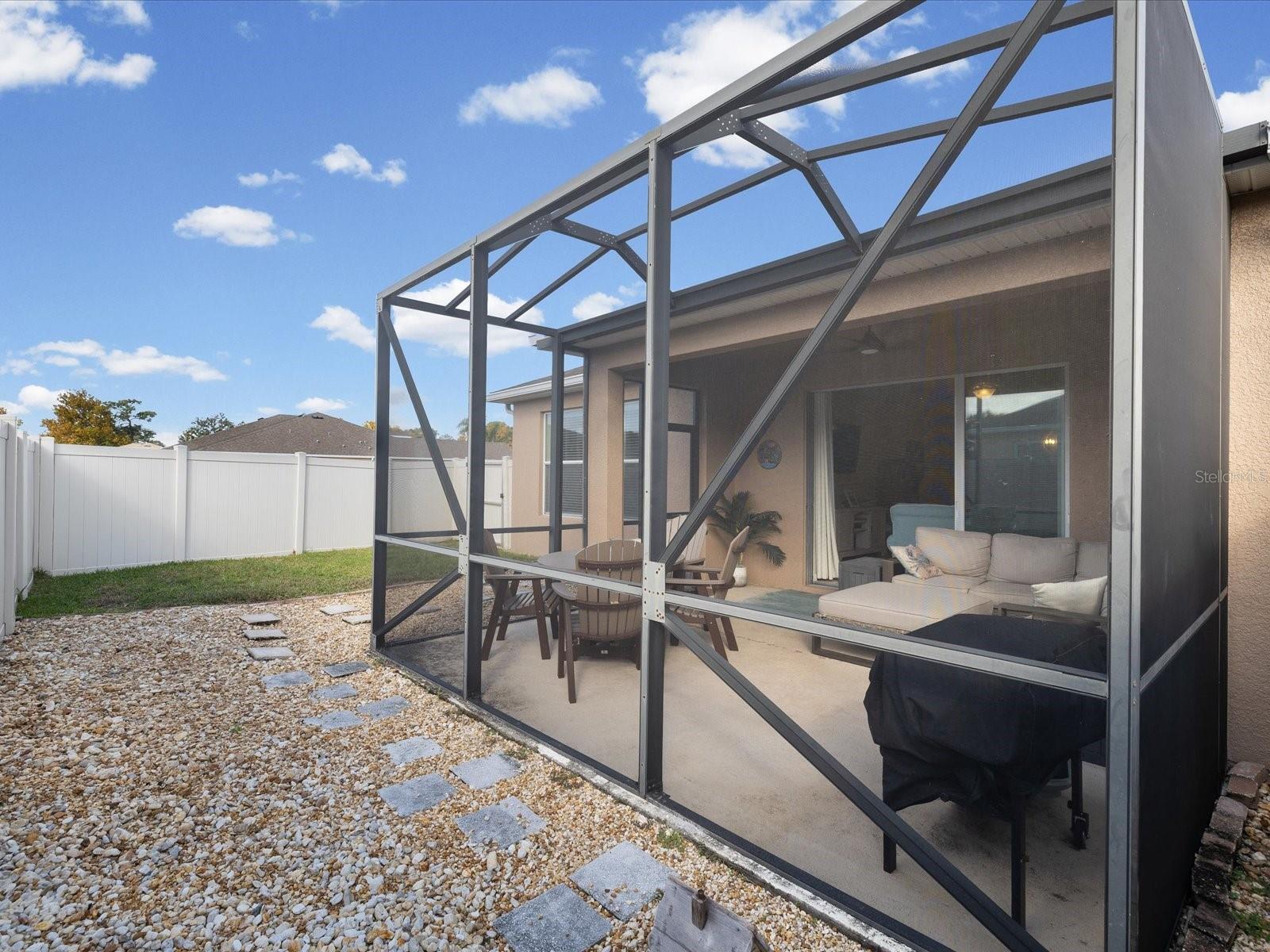 SCREENED IN LANAI AND FENCED IN BACKYARD