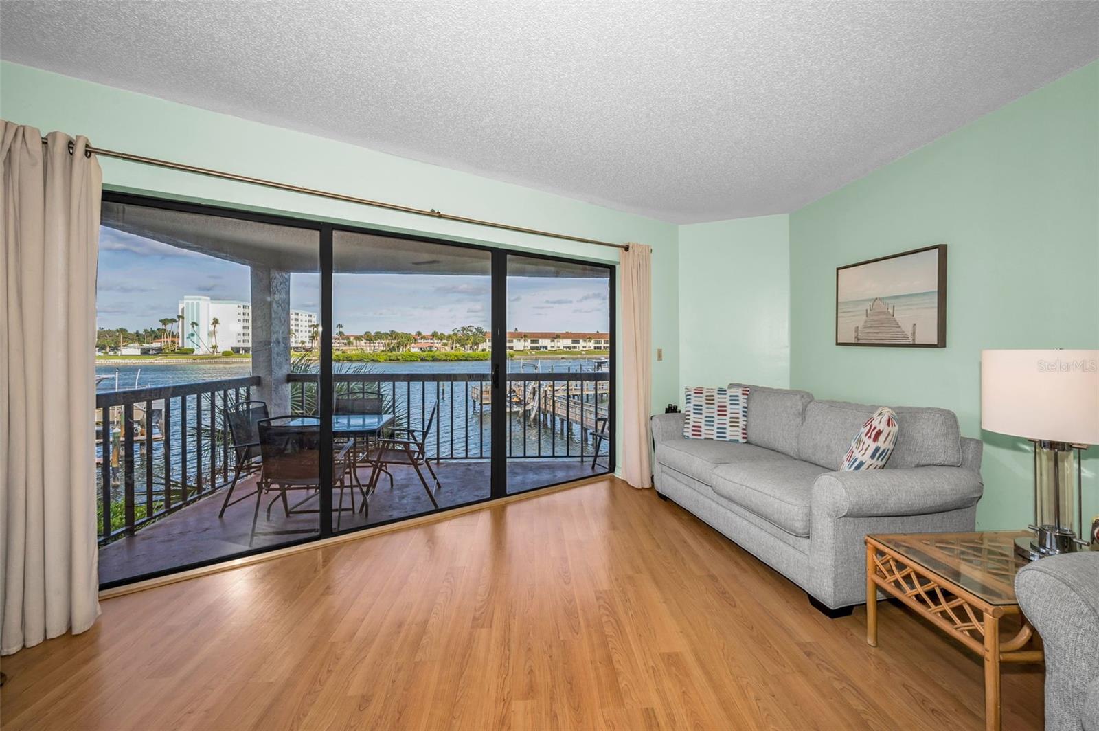 Sliding Glass doors off the Living Area to the Waterfront Balcony