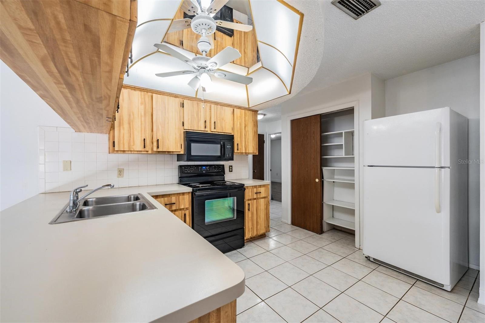 See organized pantry shelves