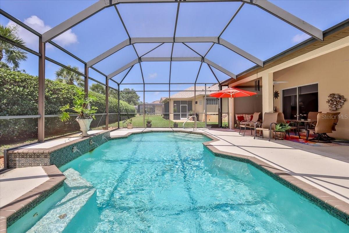 Screened Private Pool with Waterfall Spouts