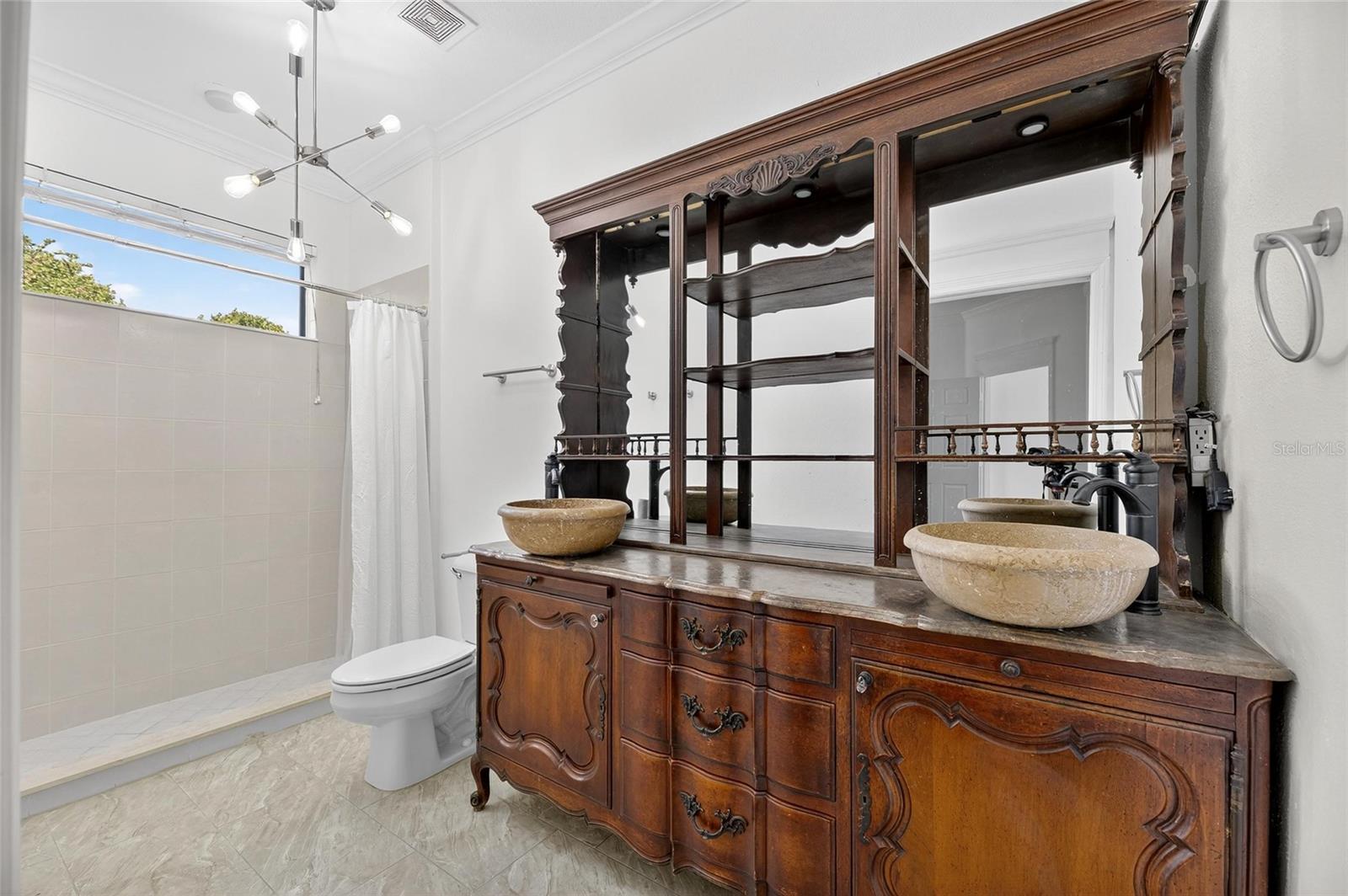 Owner's bathroom with double sinks.
