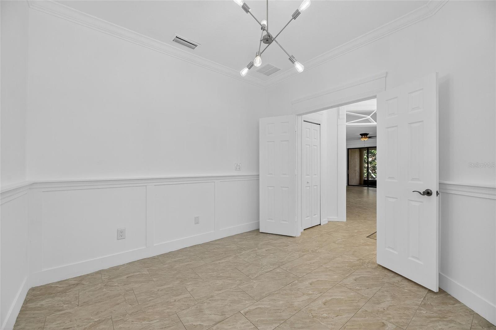 Looking out from the study/den with the open double doors.