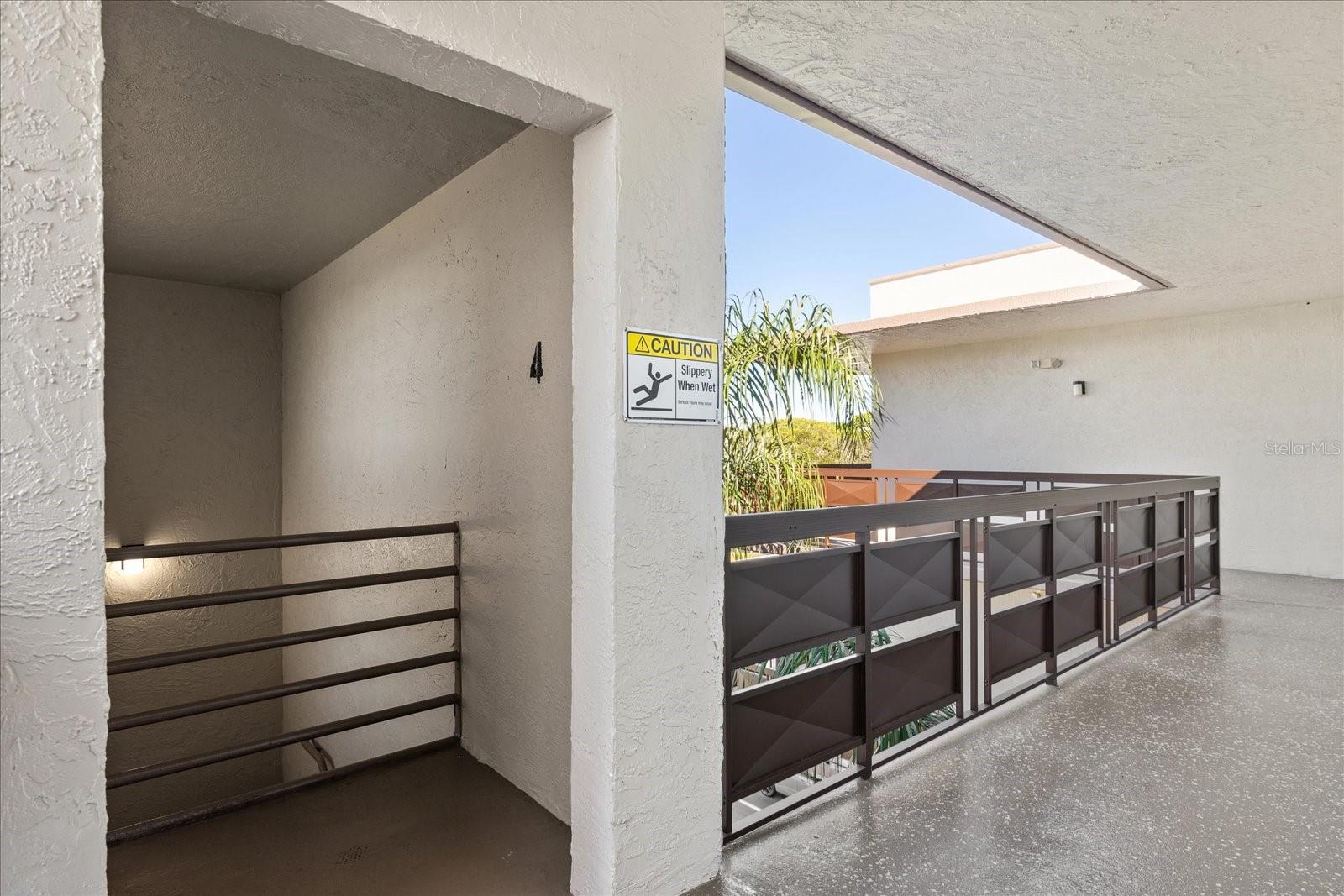 Stairwell down right at the condo entrance