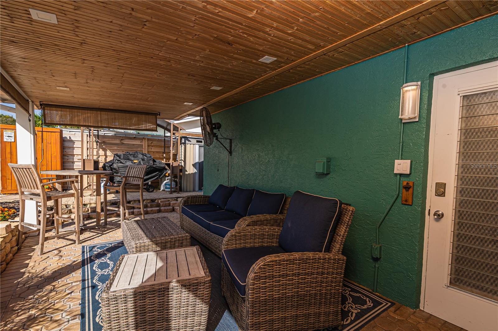 Covered Outdoor Seating with Misters and Sun Shades