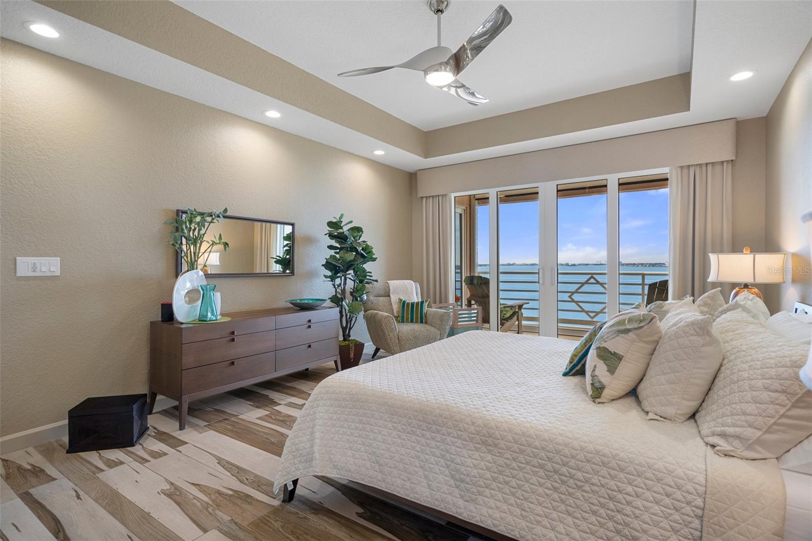 Primary Bedroom with access to balcony.