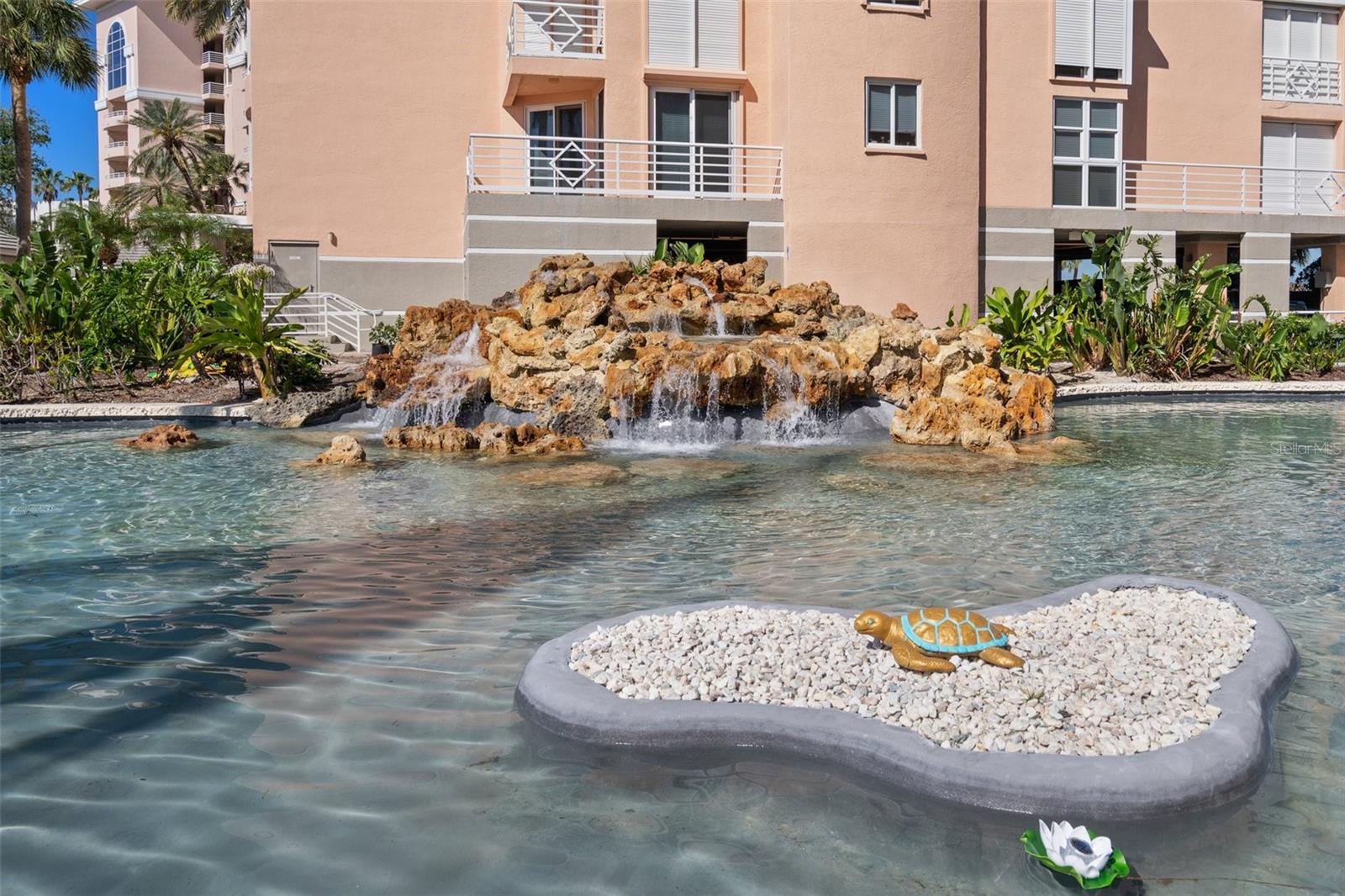 Lush Landscape and Waterfall Accents add to the Resort Vibes