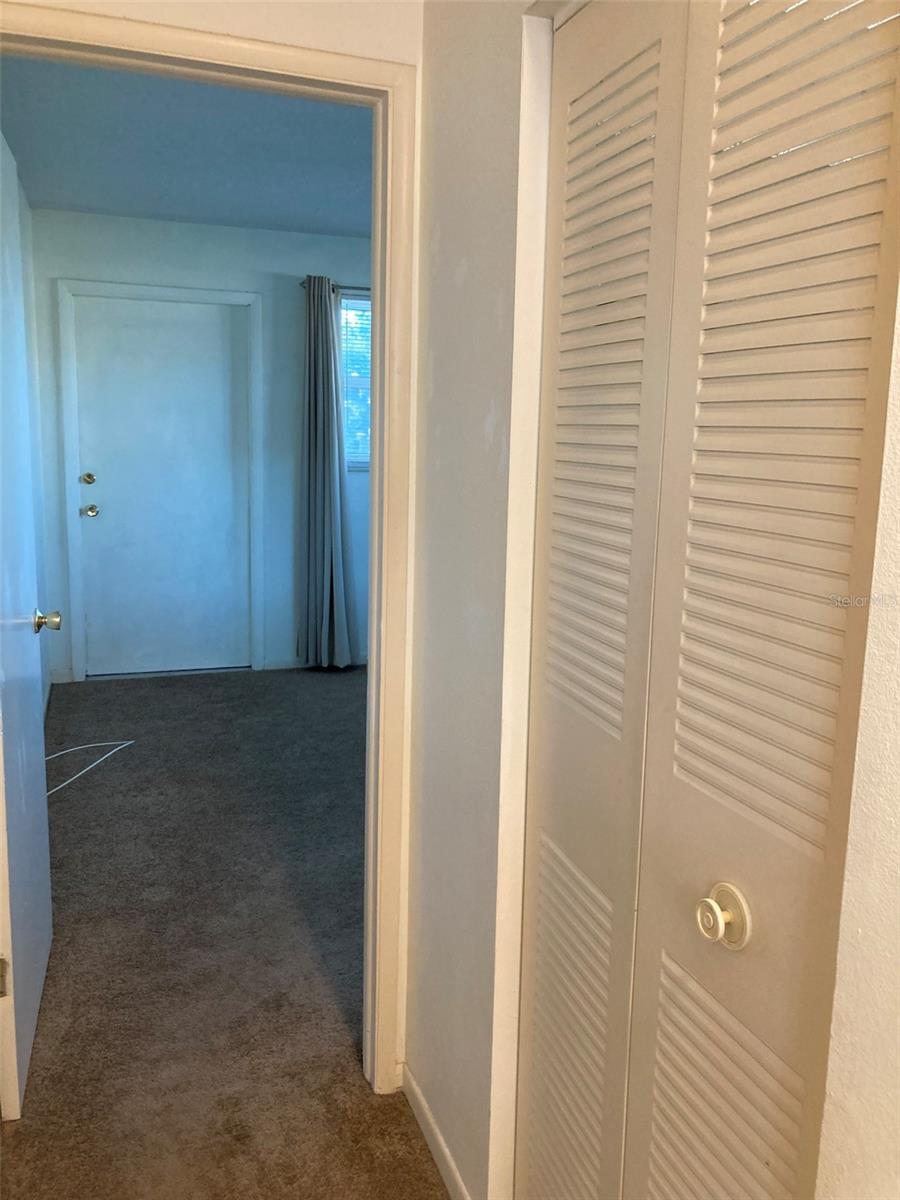 2nd bedroom with it's own exterior door and walk in closet