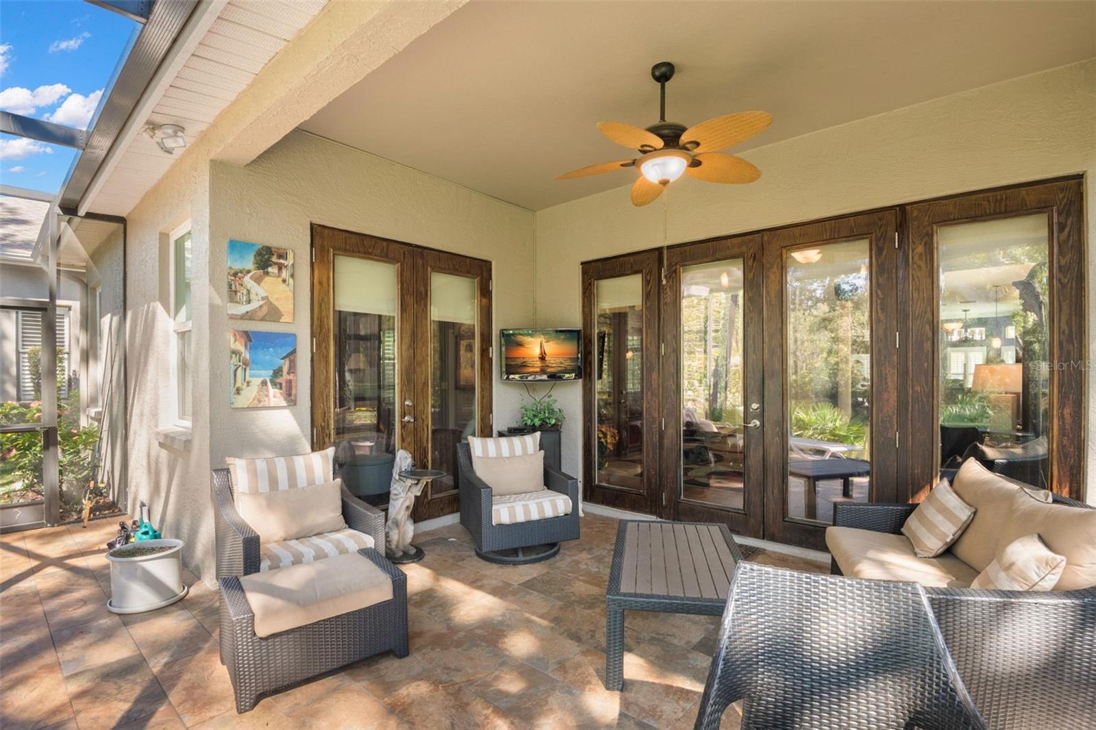 Screened lanai overlooking creek