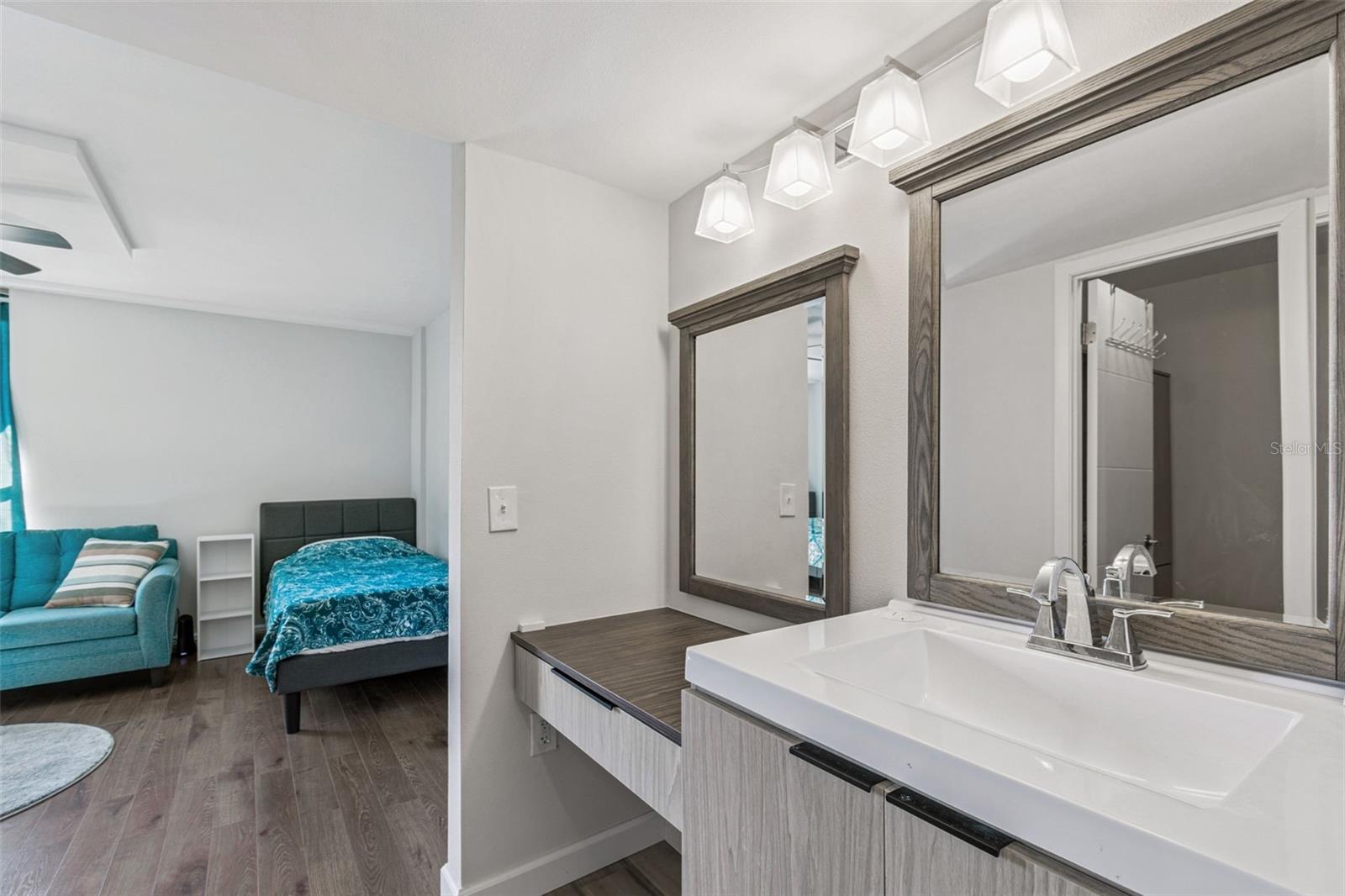 Primary Bath Looking Out To Primary Bedroom