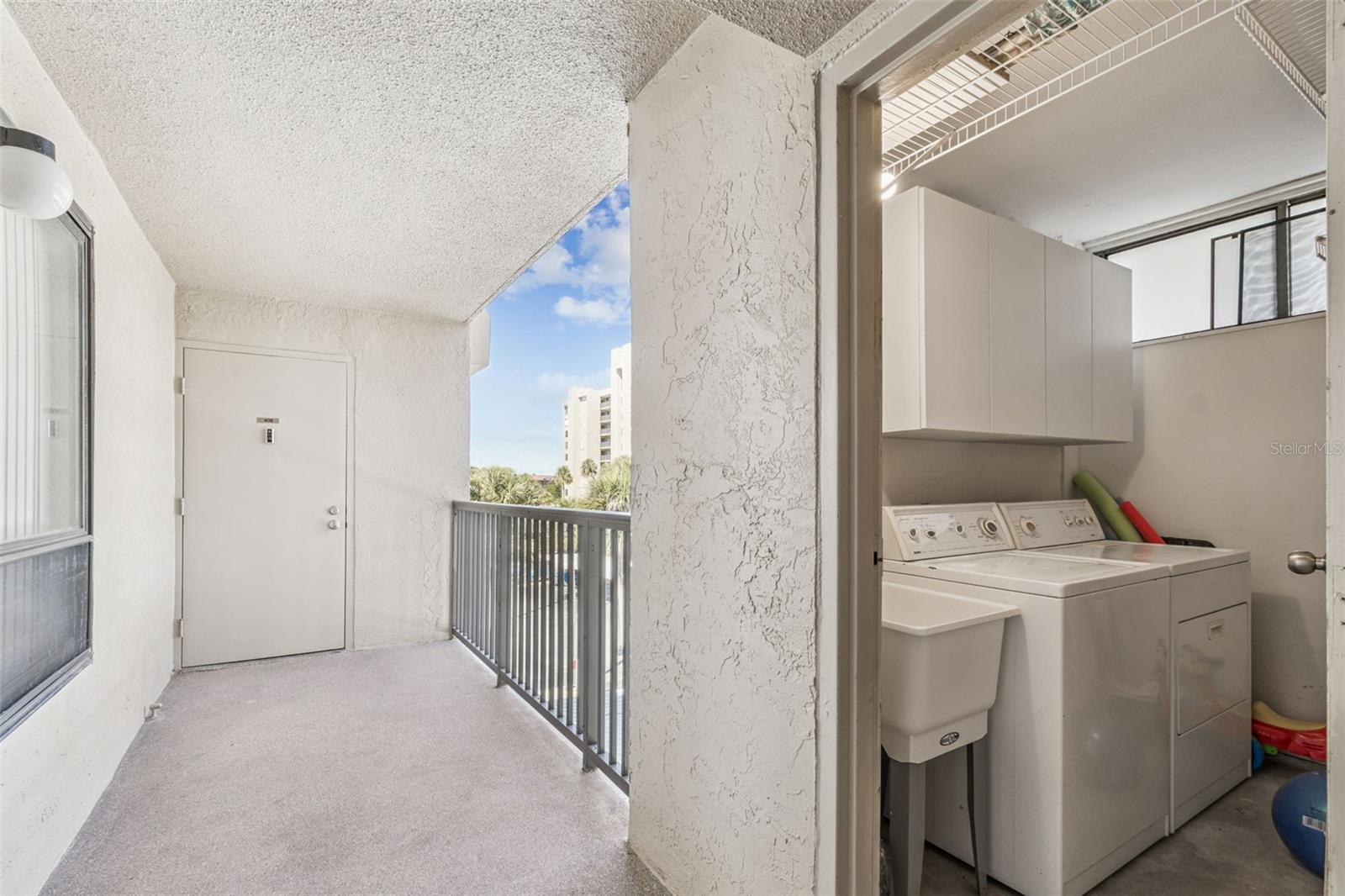 Front Entry Straight Ahead & Your Own Personal Laundry & Storage Room To The Right