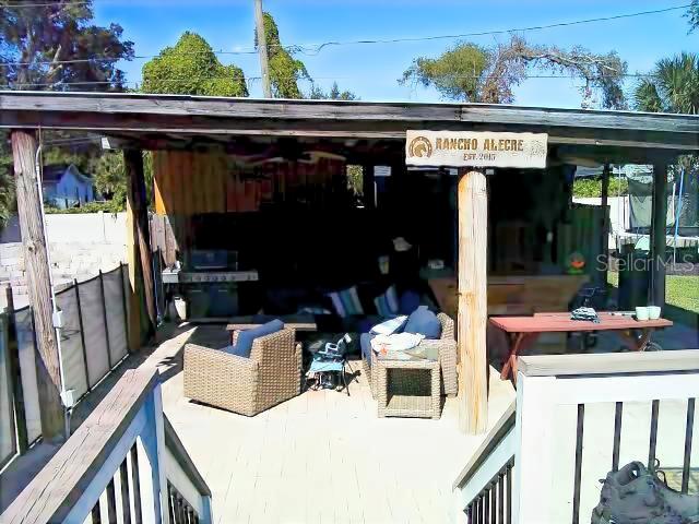 Exiting Kitchen to Upper Patio looking to Lower Patio