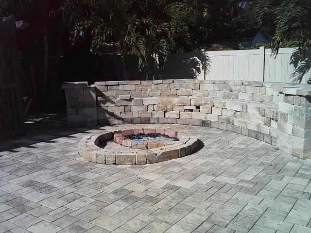 Fire Pit in Back of pool by spa area