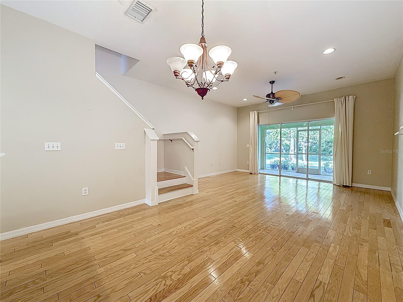 Living room leading to lanai & pavered patio