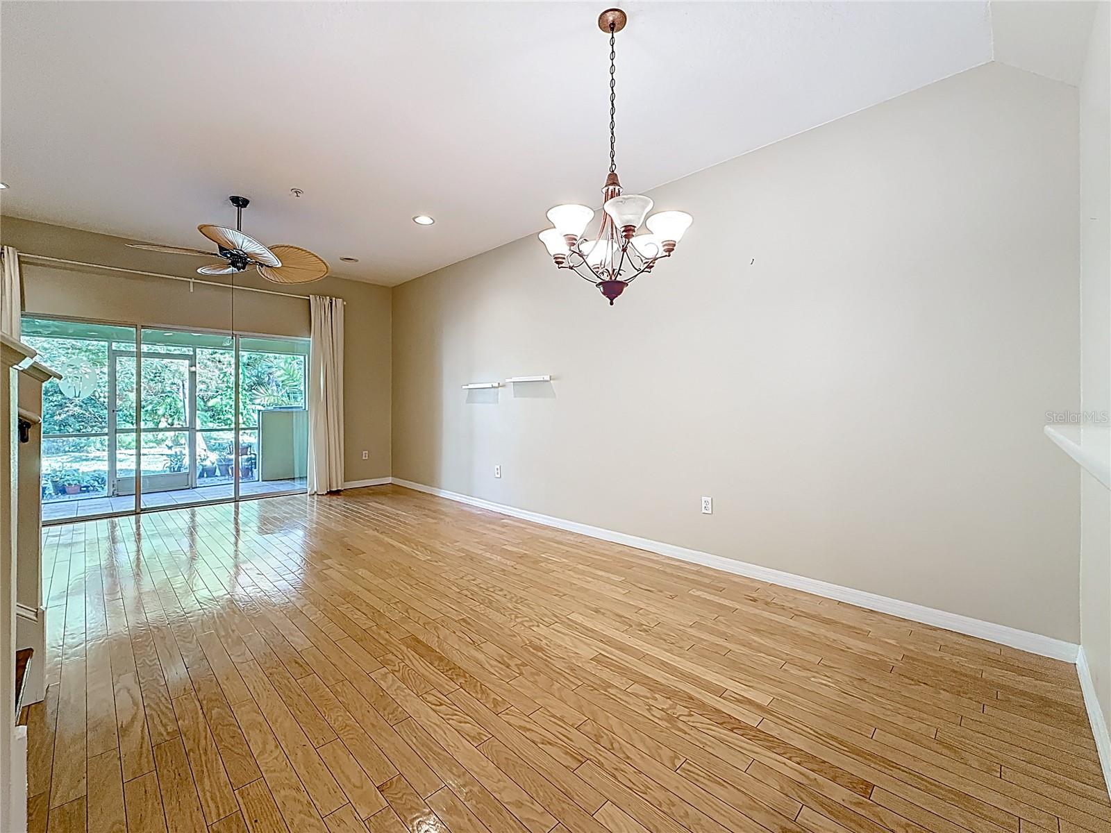 Living room leading to lanai & pavered patio