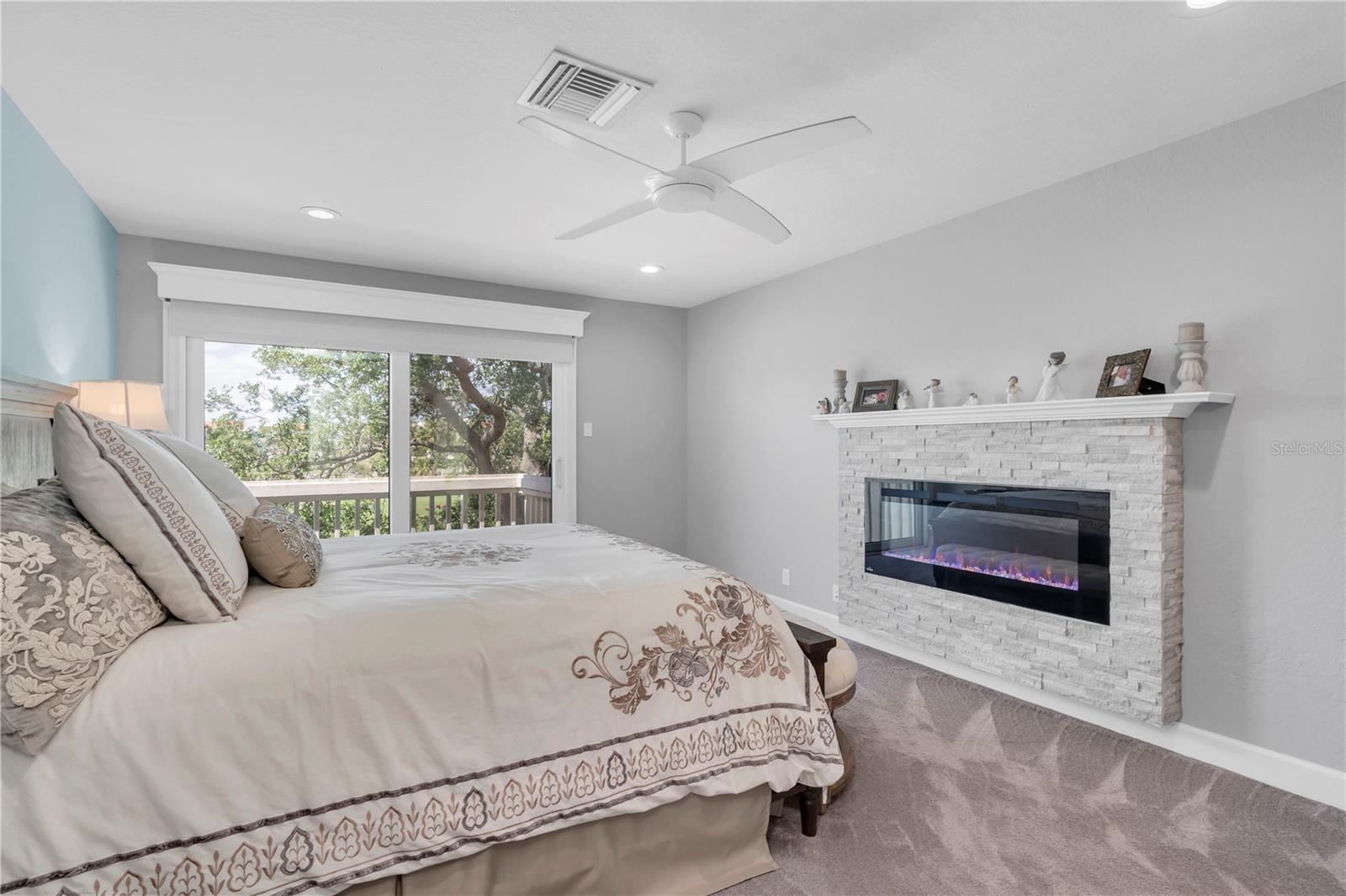 Cozy fireplace in primary suite