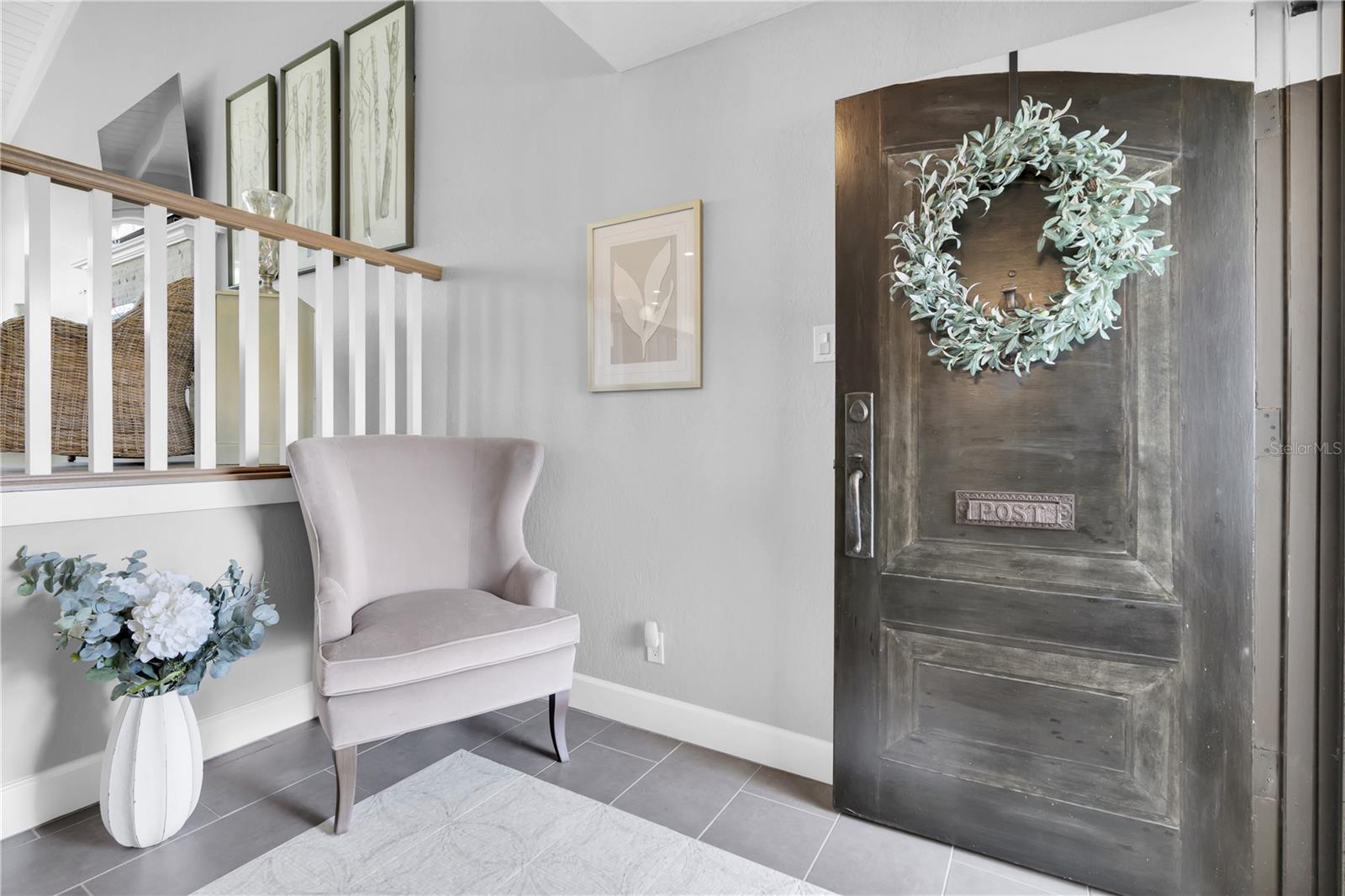 Private foyer entry. Half bathroom on this level.