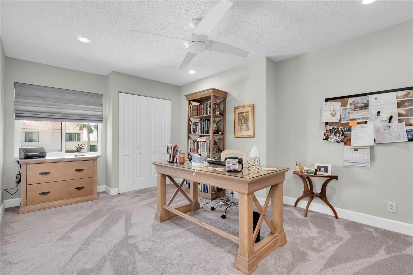 Bedroom #3 with recessed lighting, ceiling fan, and wall storage closet