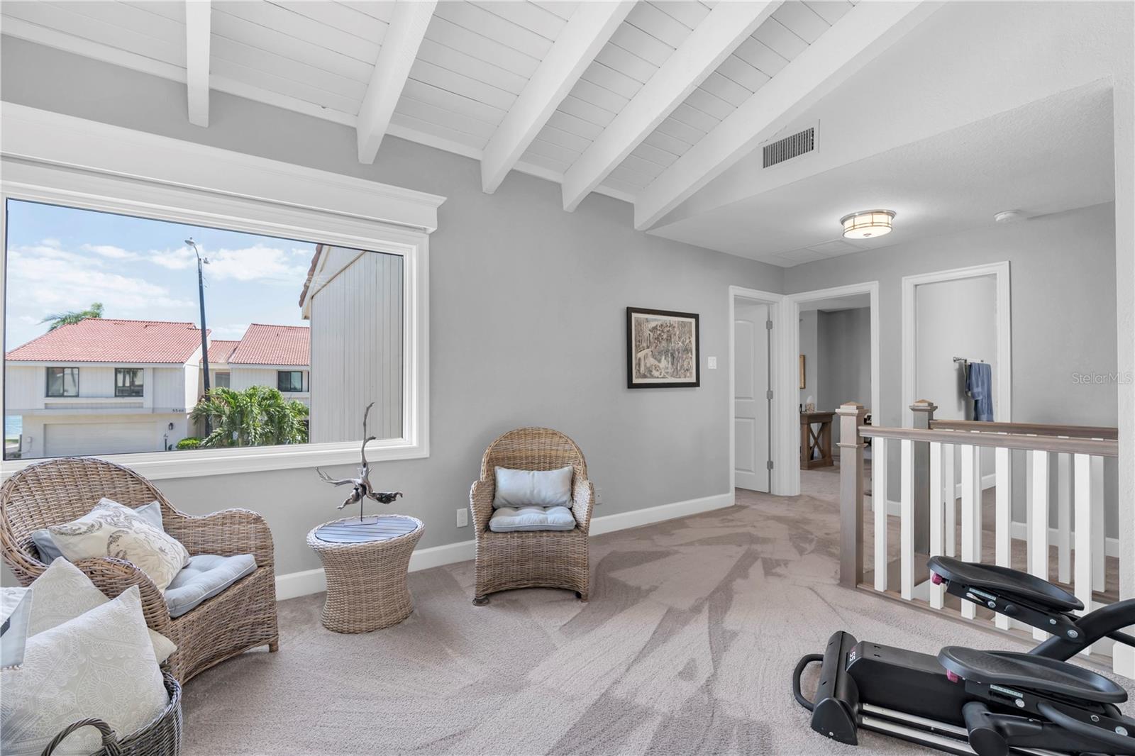 Loft space with a glimmer view of the bay