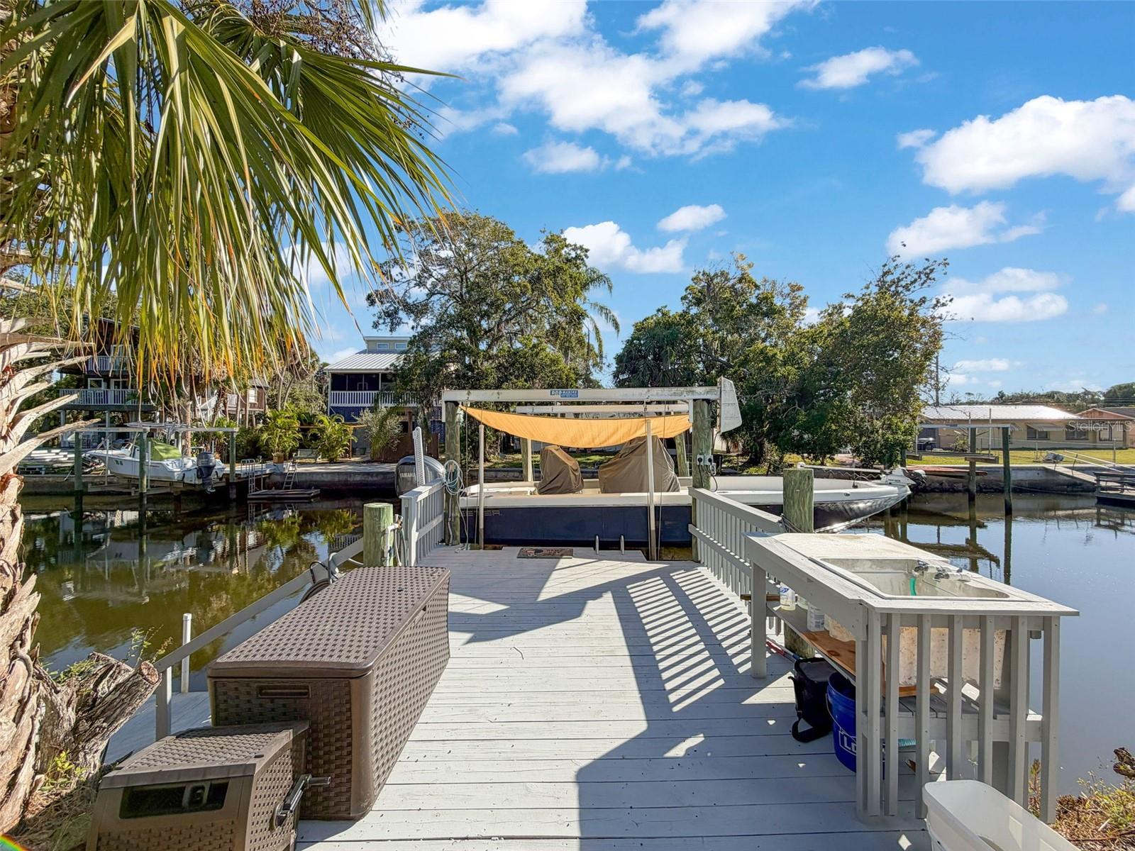 Boat dock with 10,000 lb lift, water, electric