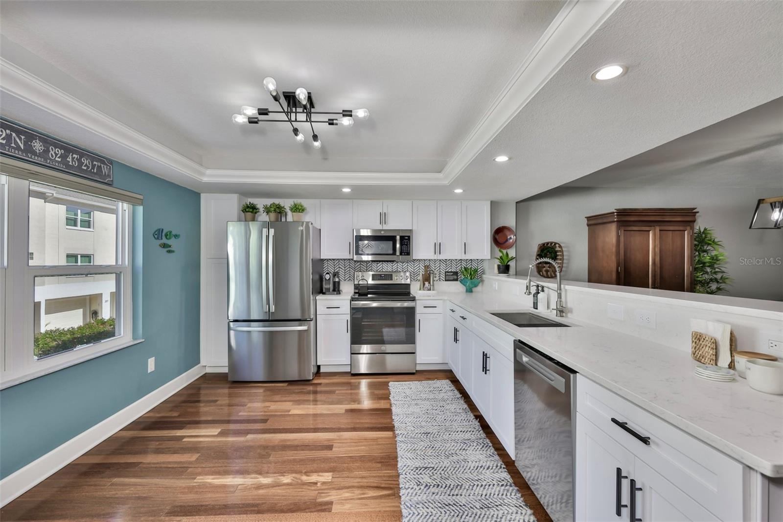 Stunning remodeled kitchen. Plenty of room for island or small table.