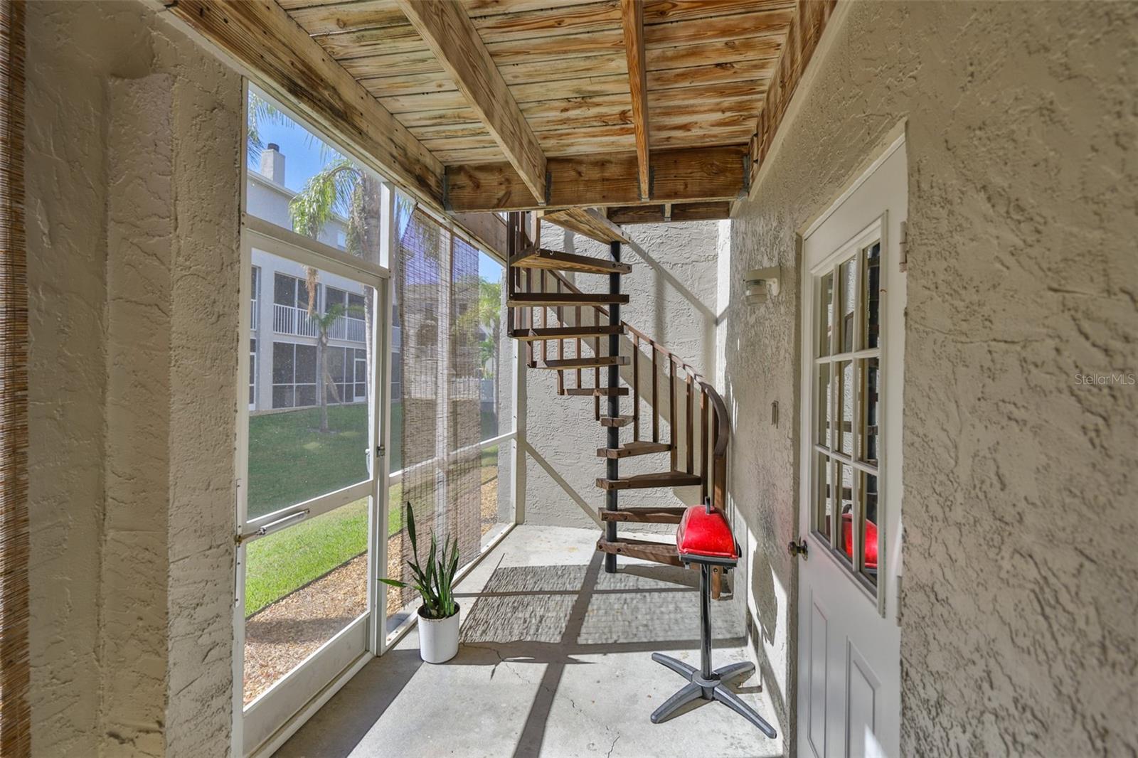 Downstairs lanai off garage.