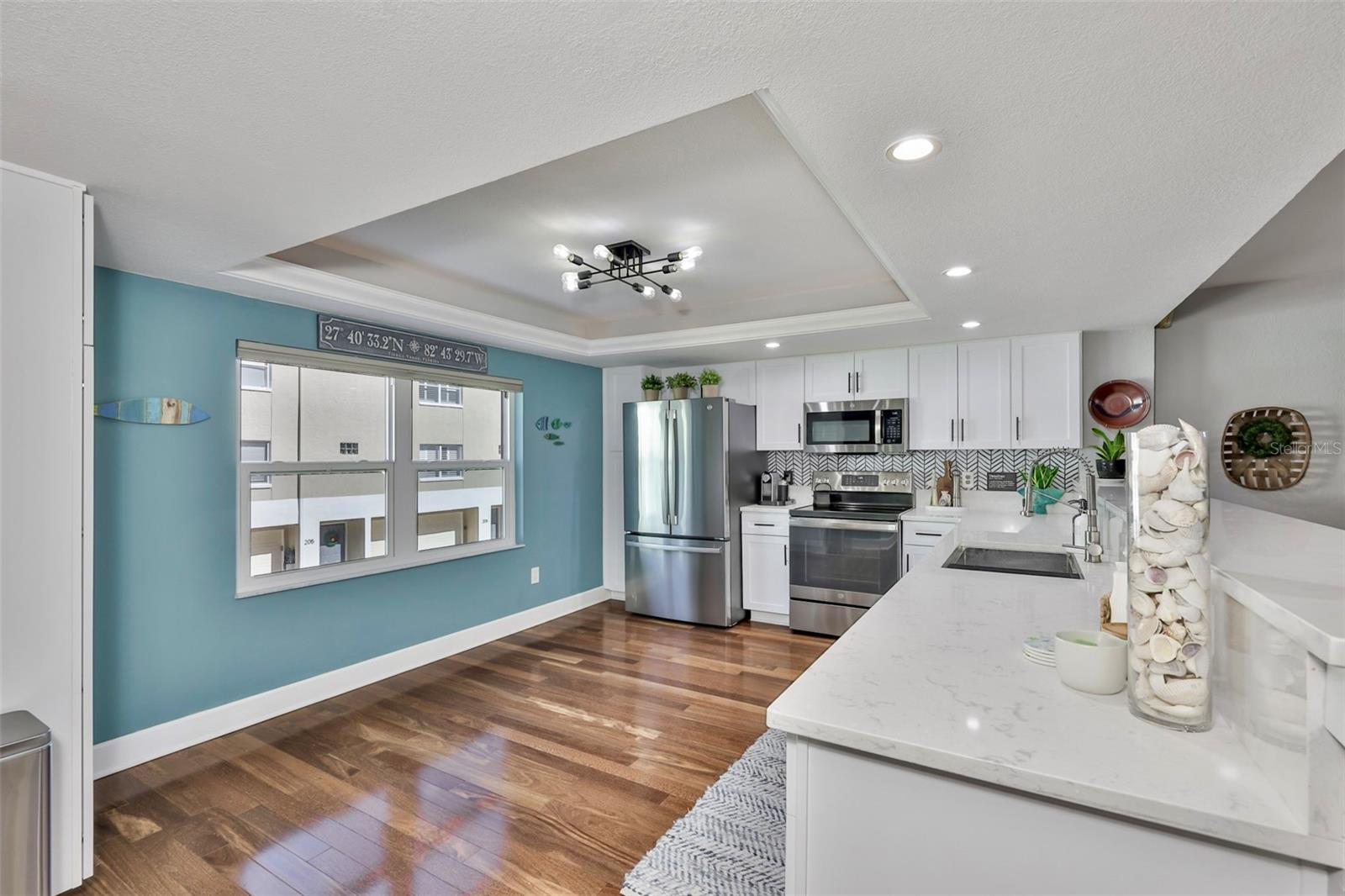 Stunning remodeled kitchen. Plenty of room for island or small table.