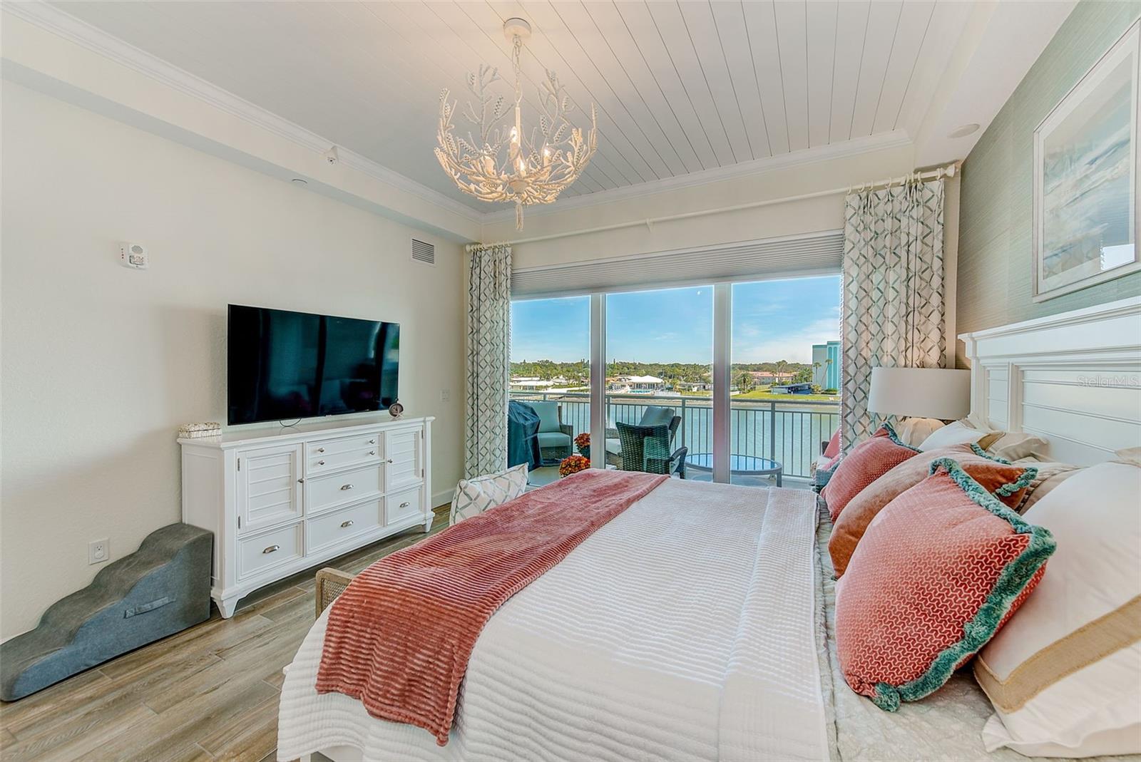 Primary Suite with shiplap detail on the ceiling
