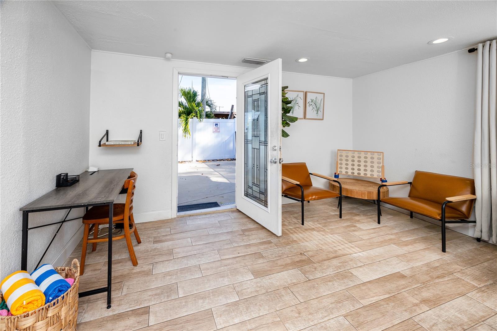 Living room leads out to the backyard