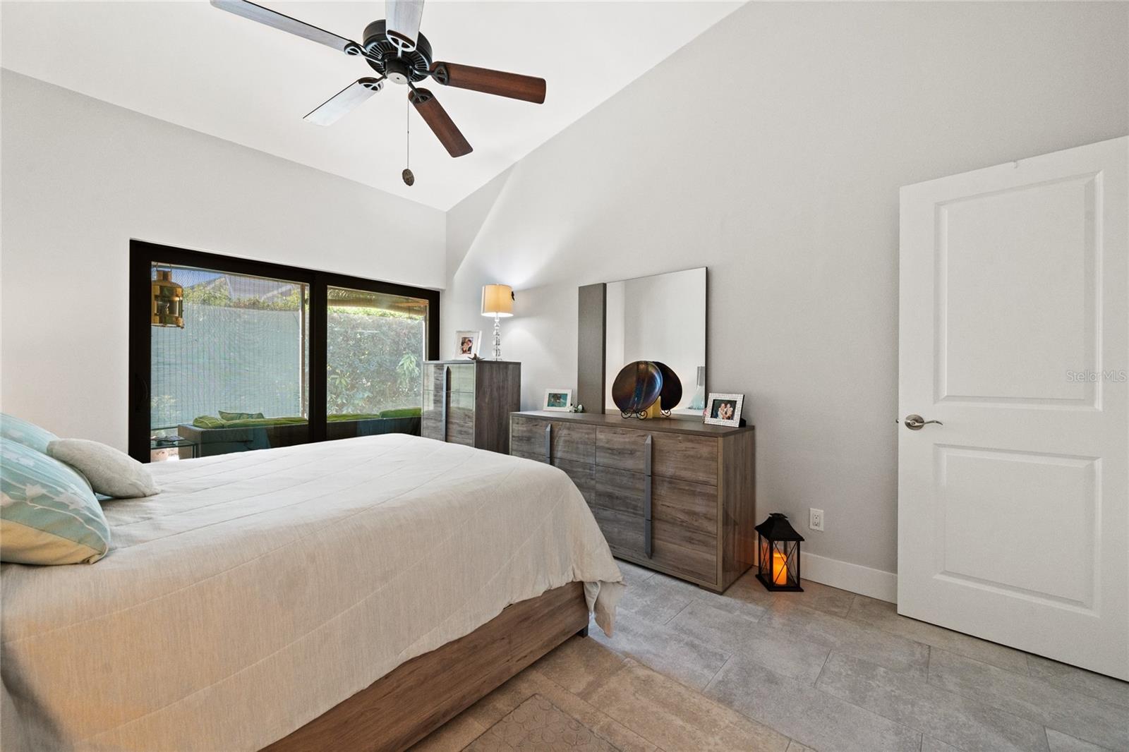 MASTER BEDROOM WITH NEW SLIDING DOORS, NEW FLOORING AND PAINT