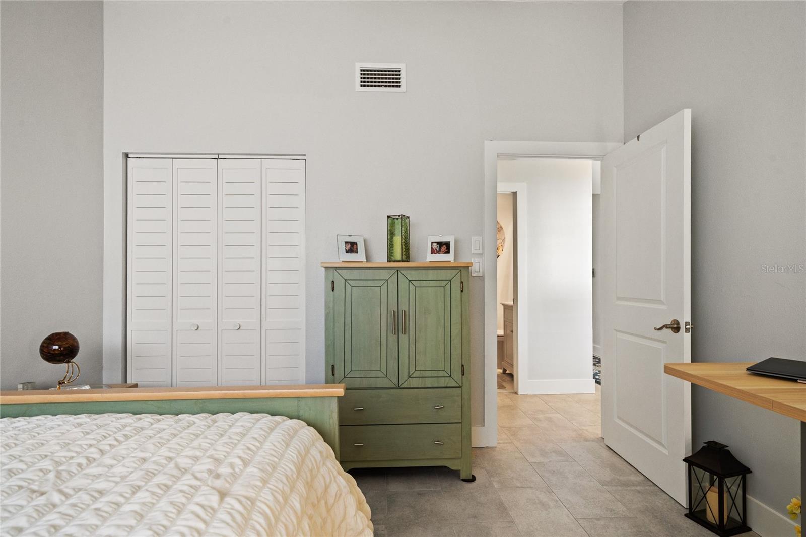 2ND BEDROOM WITH NEW FLOORING, PAINT AND INTERIOR CLOSET DOORS