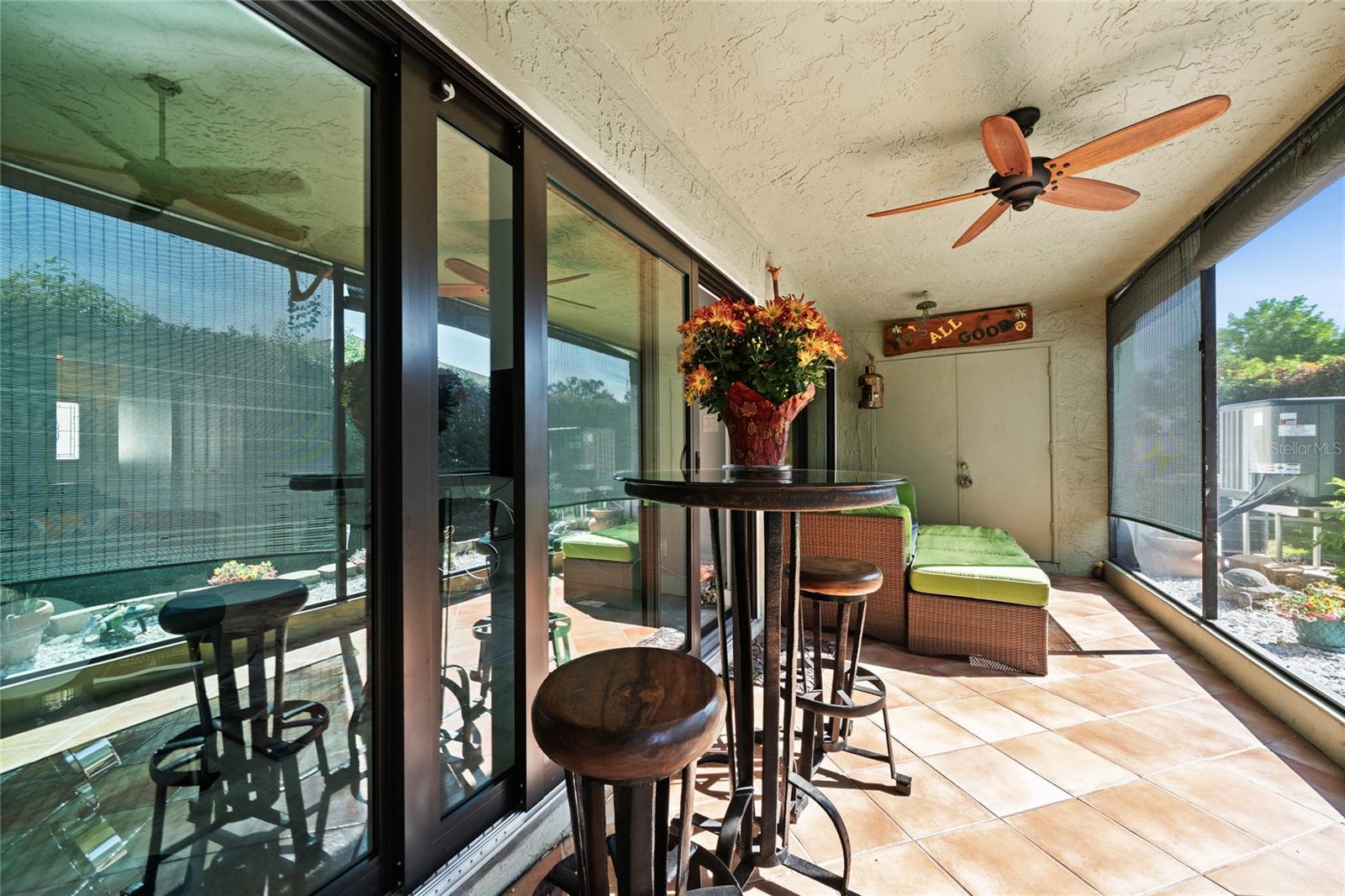 LARGE SCREENED PATIO WITH STORAGE (DOUBLE DOORS)