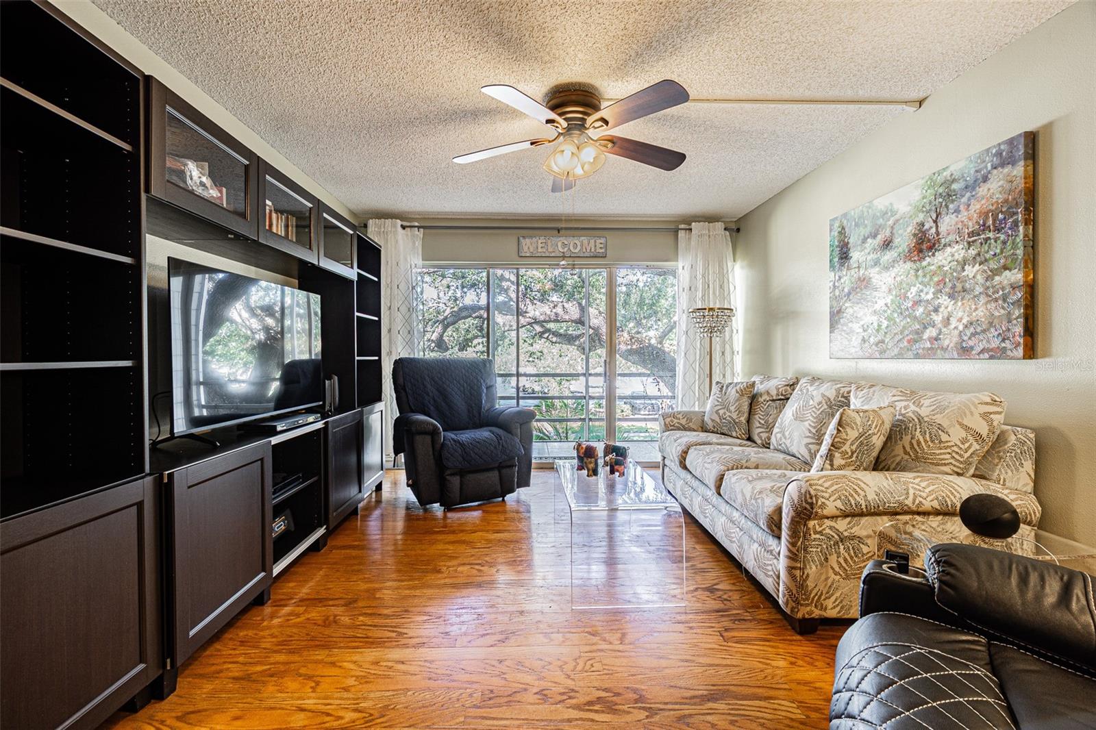 Living room to screened porch.