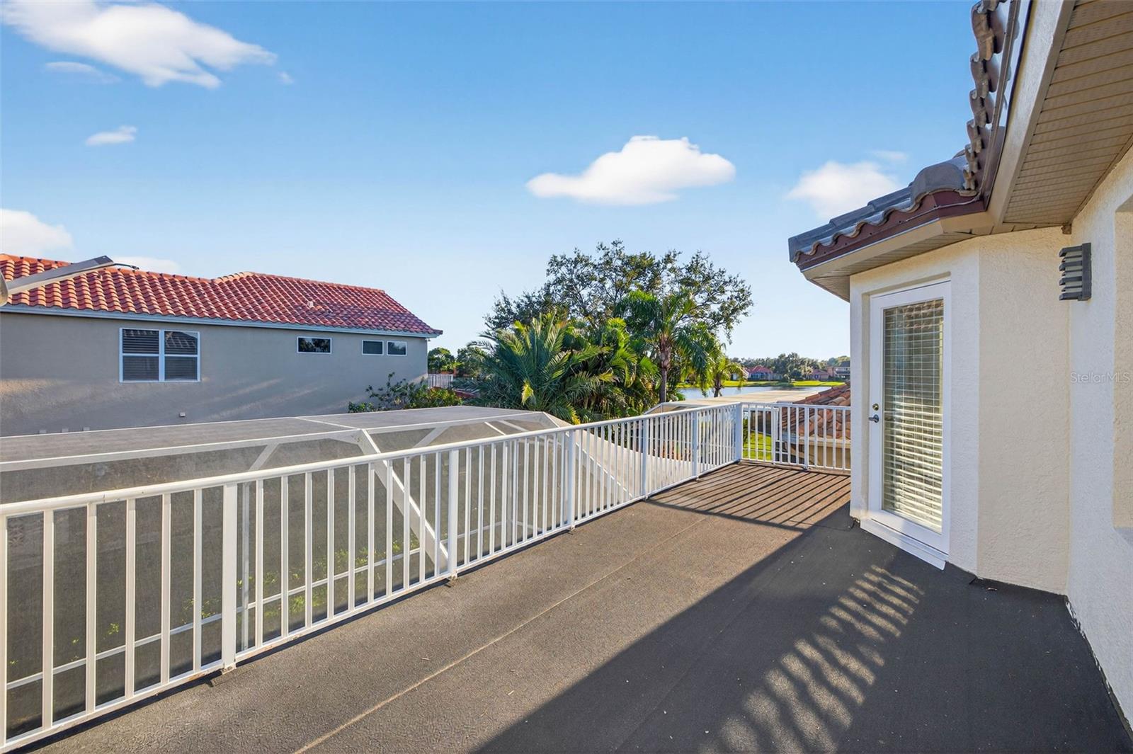 Upstairs Bedroom Balcony with Pool/Pond Views