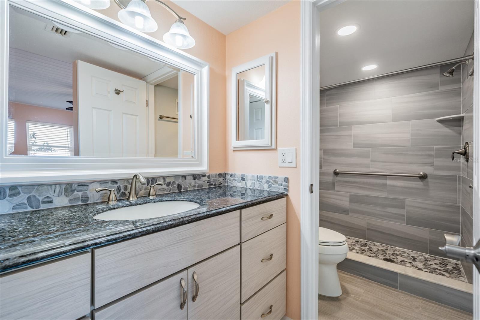 Primary Bath with granite countertops