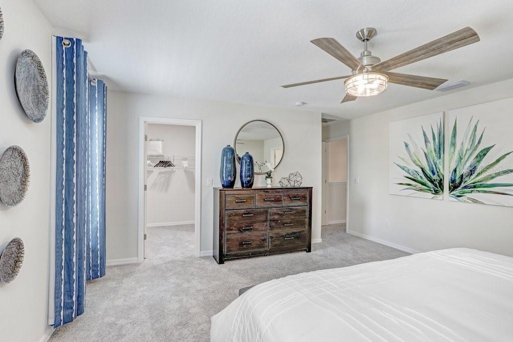 Primary Bedroom with Large Walk-in Closet (photo of model home)