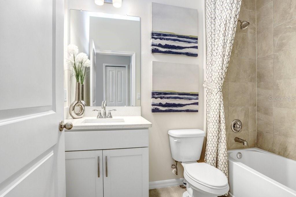 Downstairs Full Bath (photo of model home)