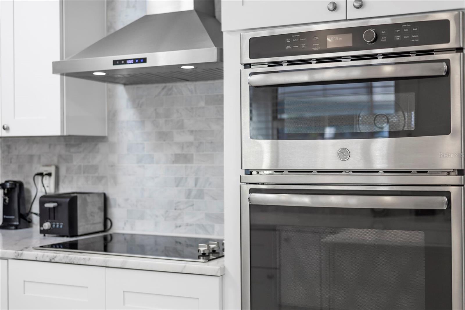 Built In Wall Oven, Microwave, Cooktop and Stainless Steel Hood Vent
