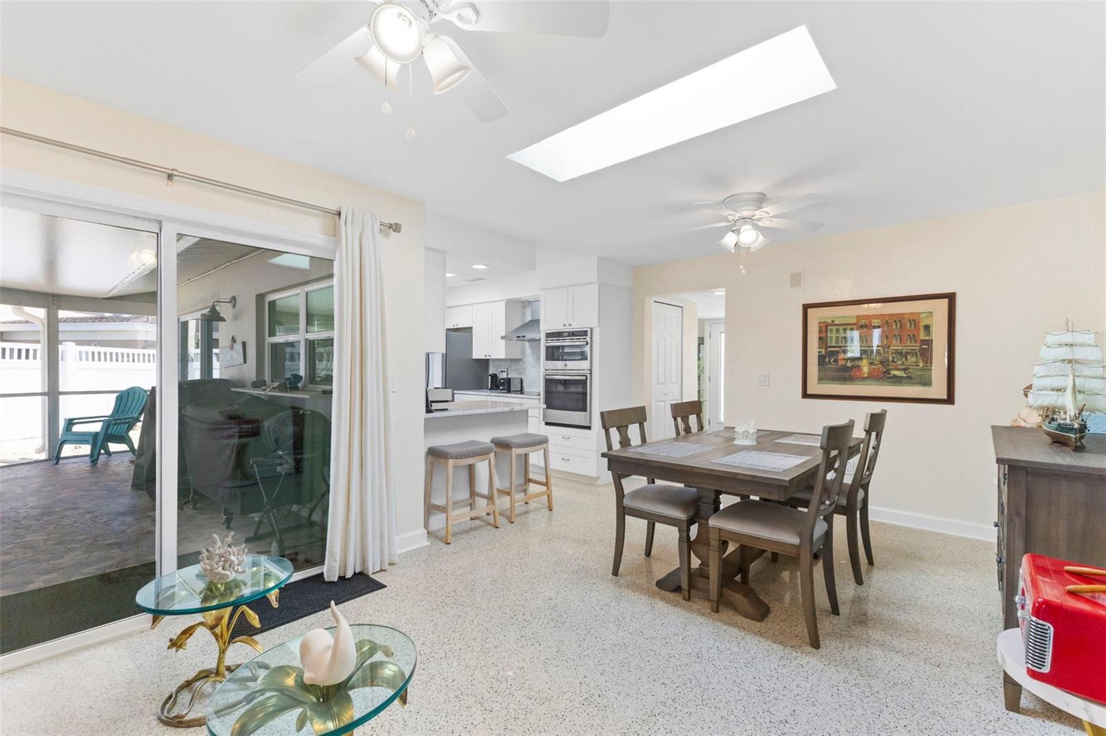 Dining Area off the kitchen with skylight for a very bright room