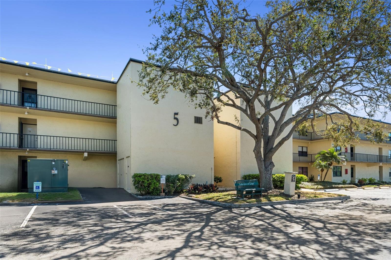 Your condo on the top floor, to the left of the building 5 elevator tower
