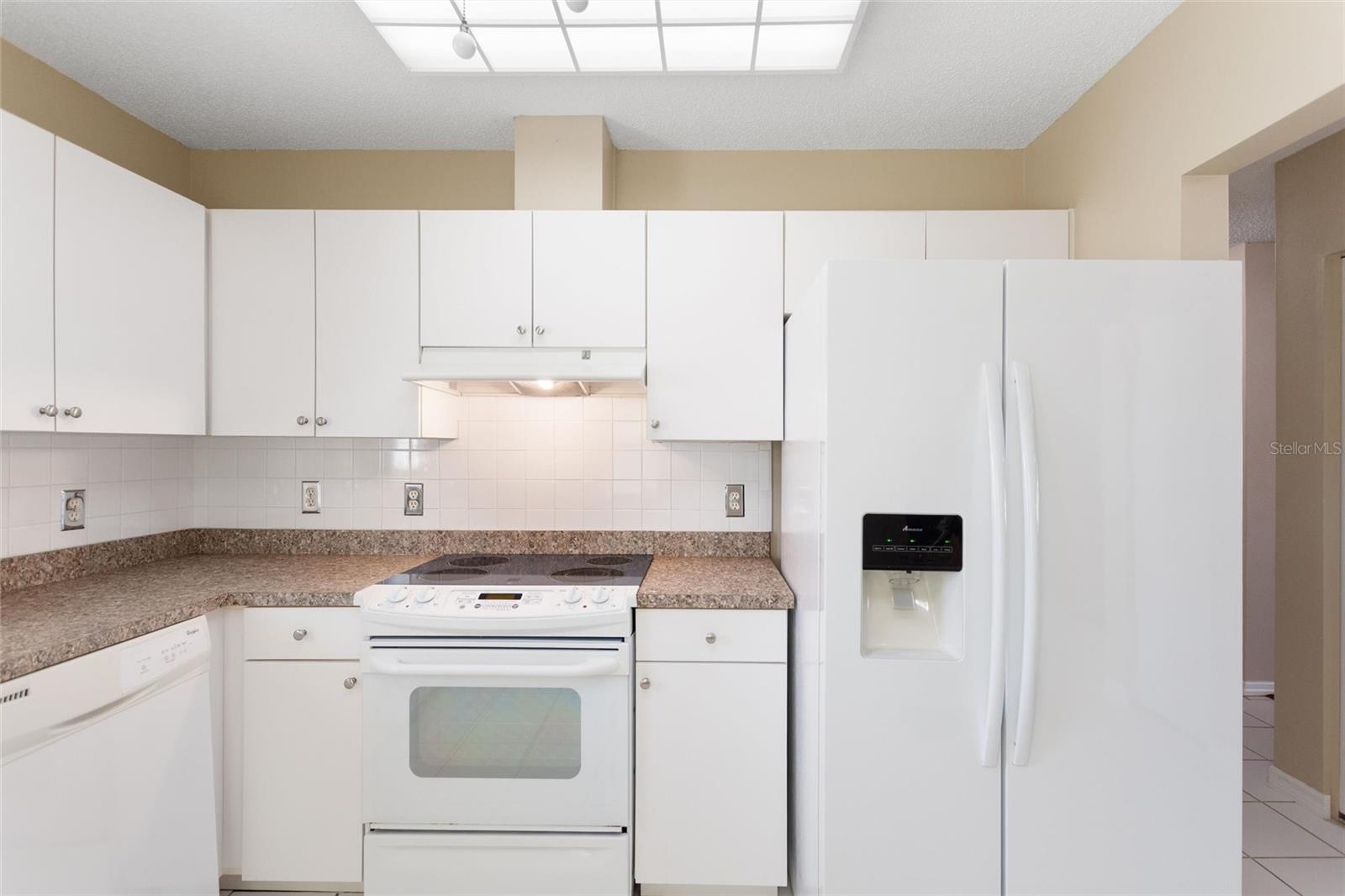 Reverse view of kitchen.  It is located on the front side of the houe.