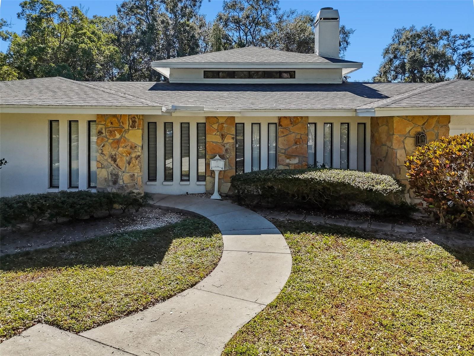 Mature landscaping .